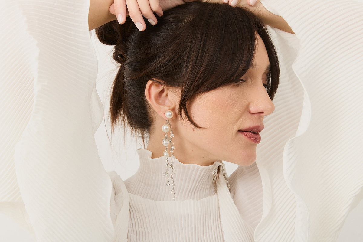 Model wearing the Margot Pearl Earrings, a unique jewellery gift for her this Christmas